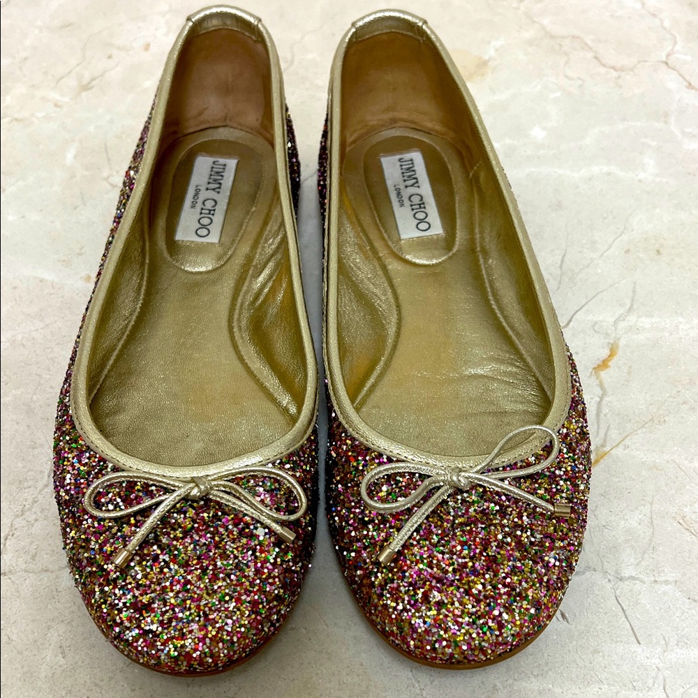 Jimmy Choo ballet flats.  Multi colored gold sparkle with bow. Size 40 1/2